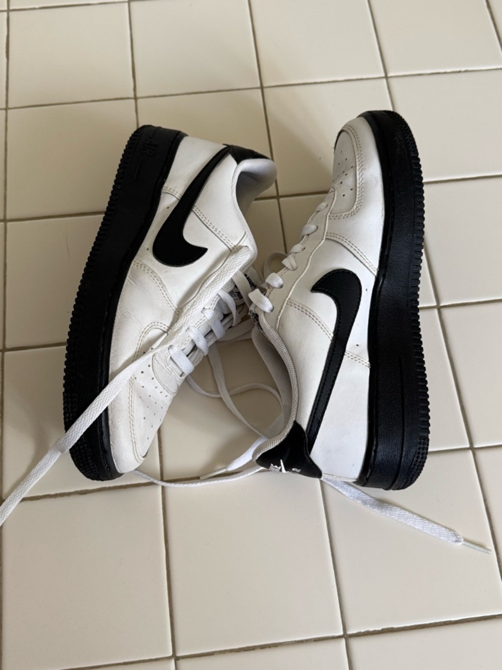 Nike Air Force 1 White and Black Swoosh Low-Top Sneakers